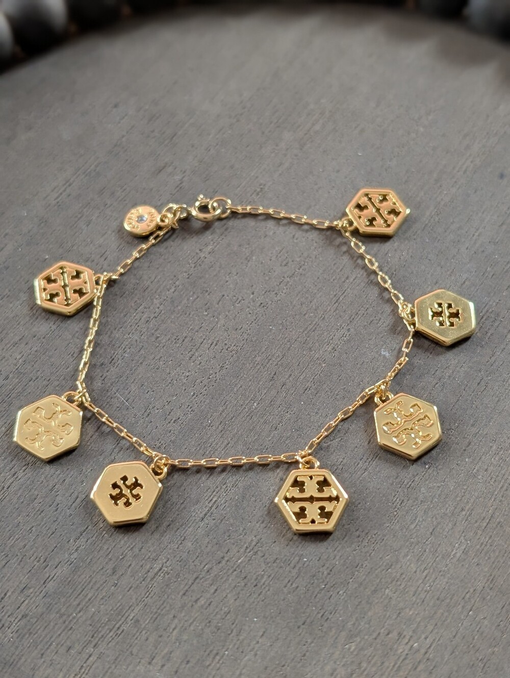 TORY BURCH Hexagon Logo Charm Gold Tone Bracelet